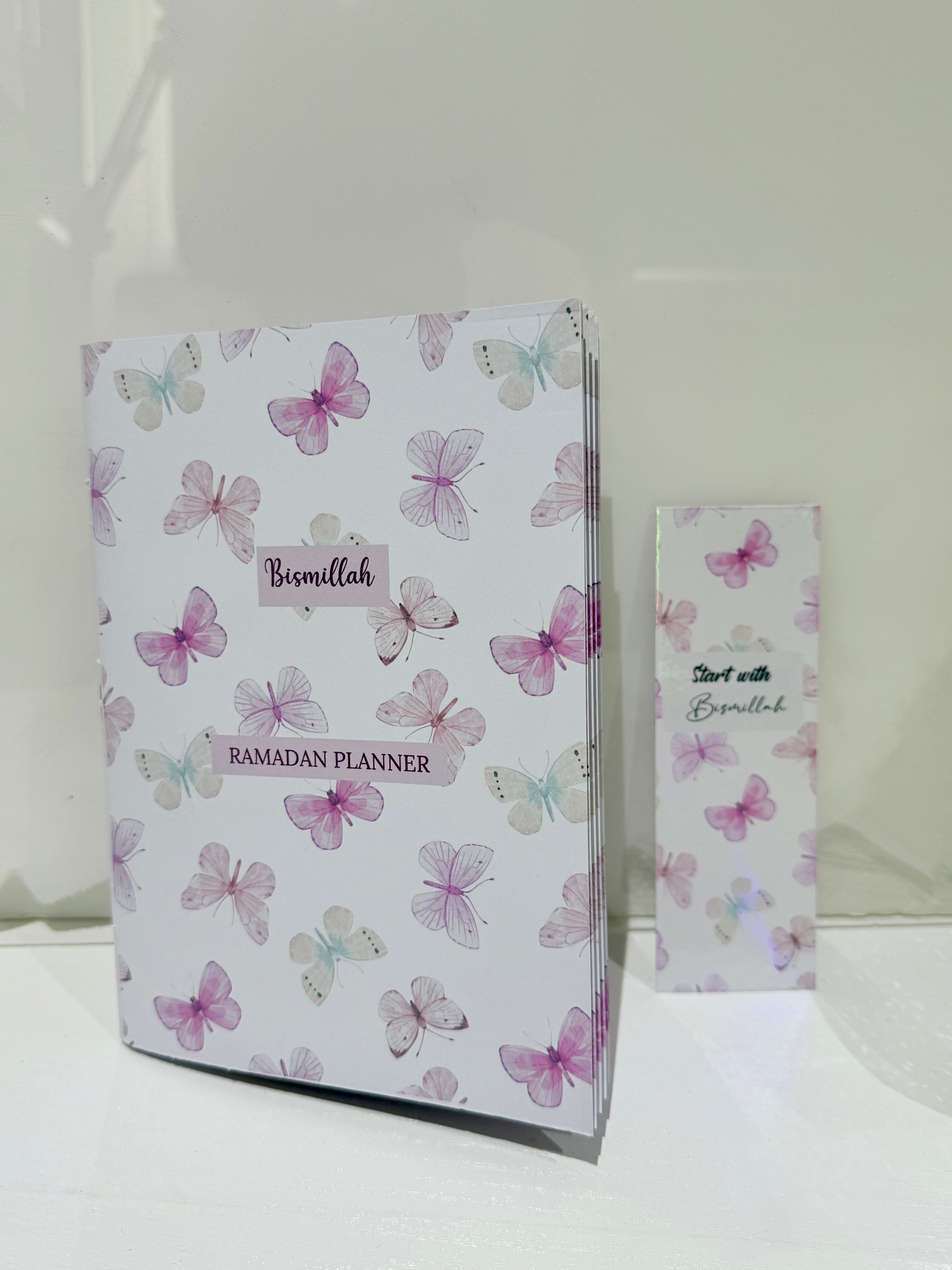 Ramadan planner with butterfly design on a white background